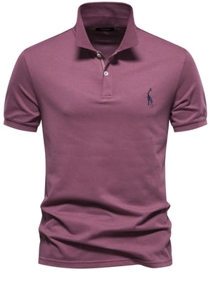 Deep purple piqué polo shirt with giraffe embroidery and button placket.