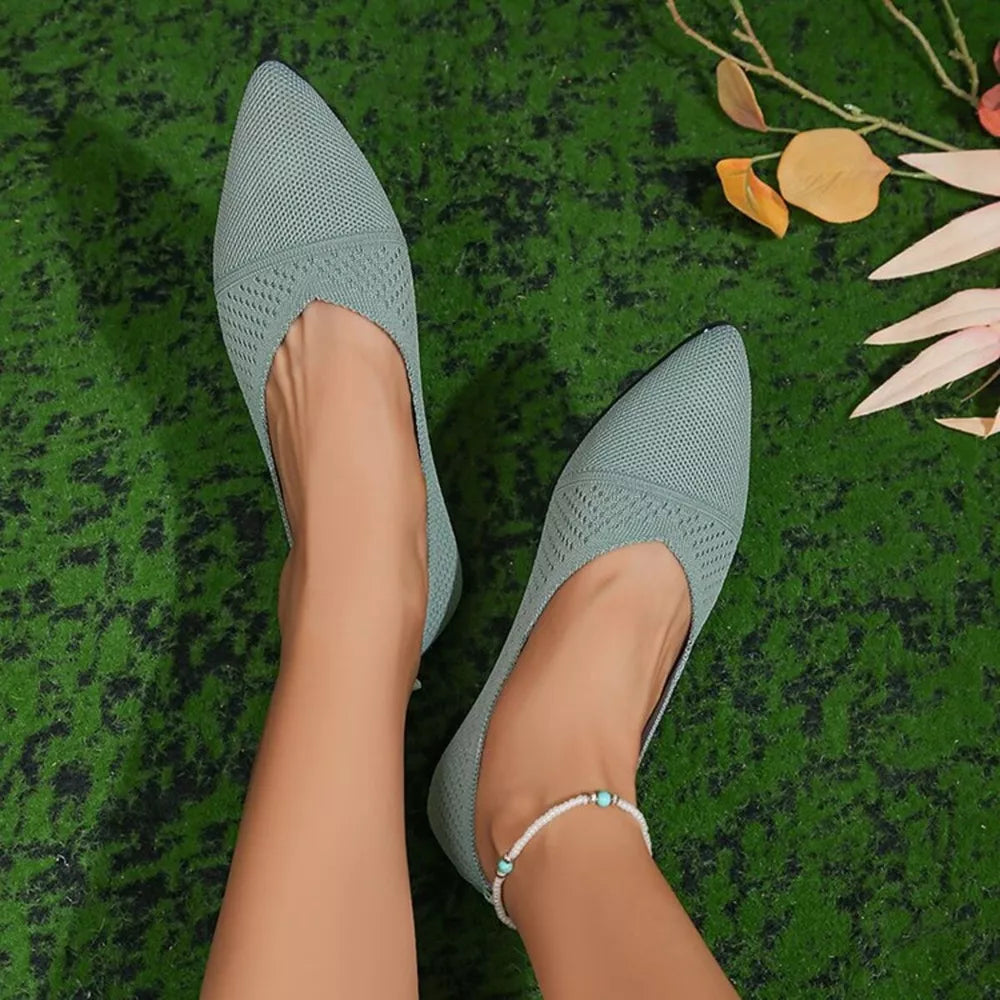 Light blue knit pointed toe flats with textured detail and a turquoise beaded anklet.