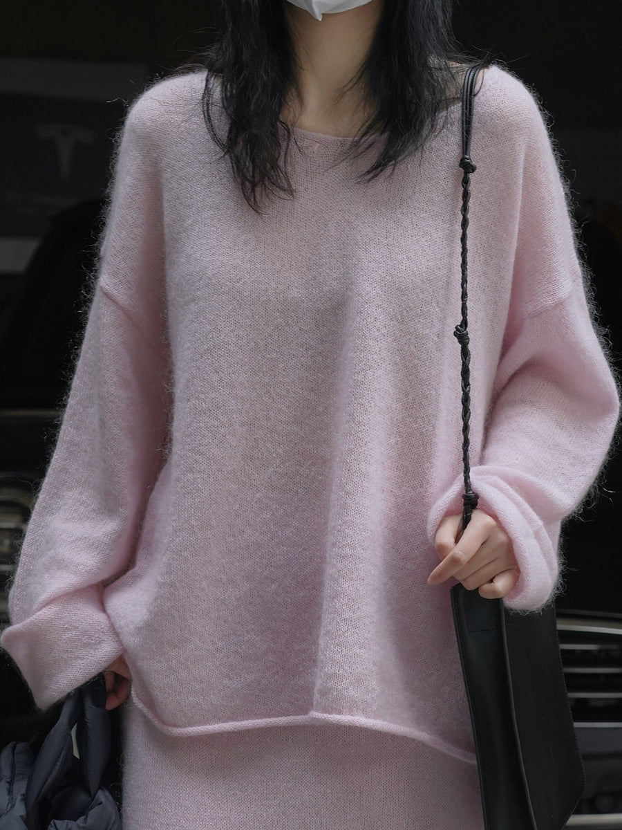 pullover sweater in light pink featuring openwork and oversized fit