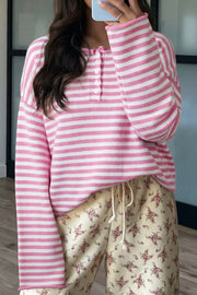 52% viscose, 26% polyester, 22% polyamide Care instructions: Machine wash cold pullover sweater in Blush Pink with relaxed