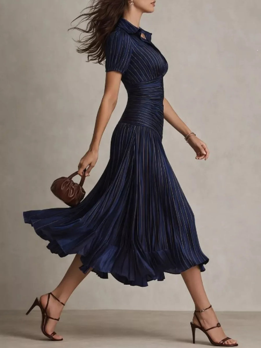 Navy pinstripe midi dress with short sleeves, collared neckline, and pleated skirt.