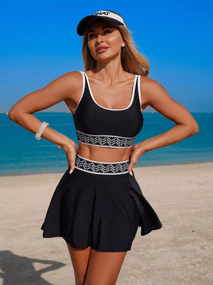 Black tank top and skort set with white contrast trim and patterned waistband