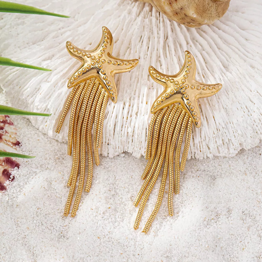 gold earrings with motif and N/A
