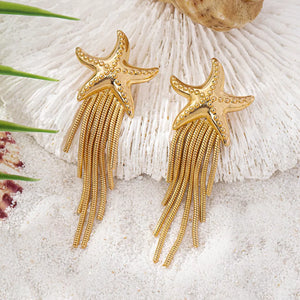 gold earrings with motif and N/A
