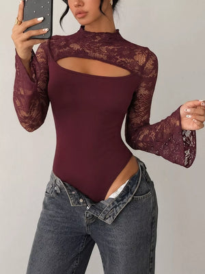 Burgundy lace bodysuit with mock neck, cut-out detail, and bell sleeves.