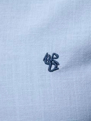 Light blue linen shirt with embroidered detail