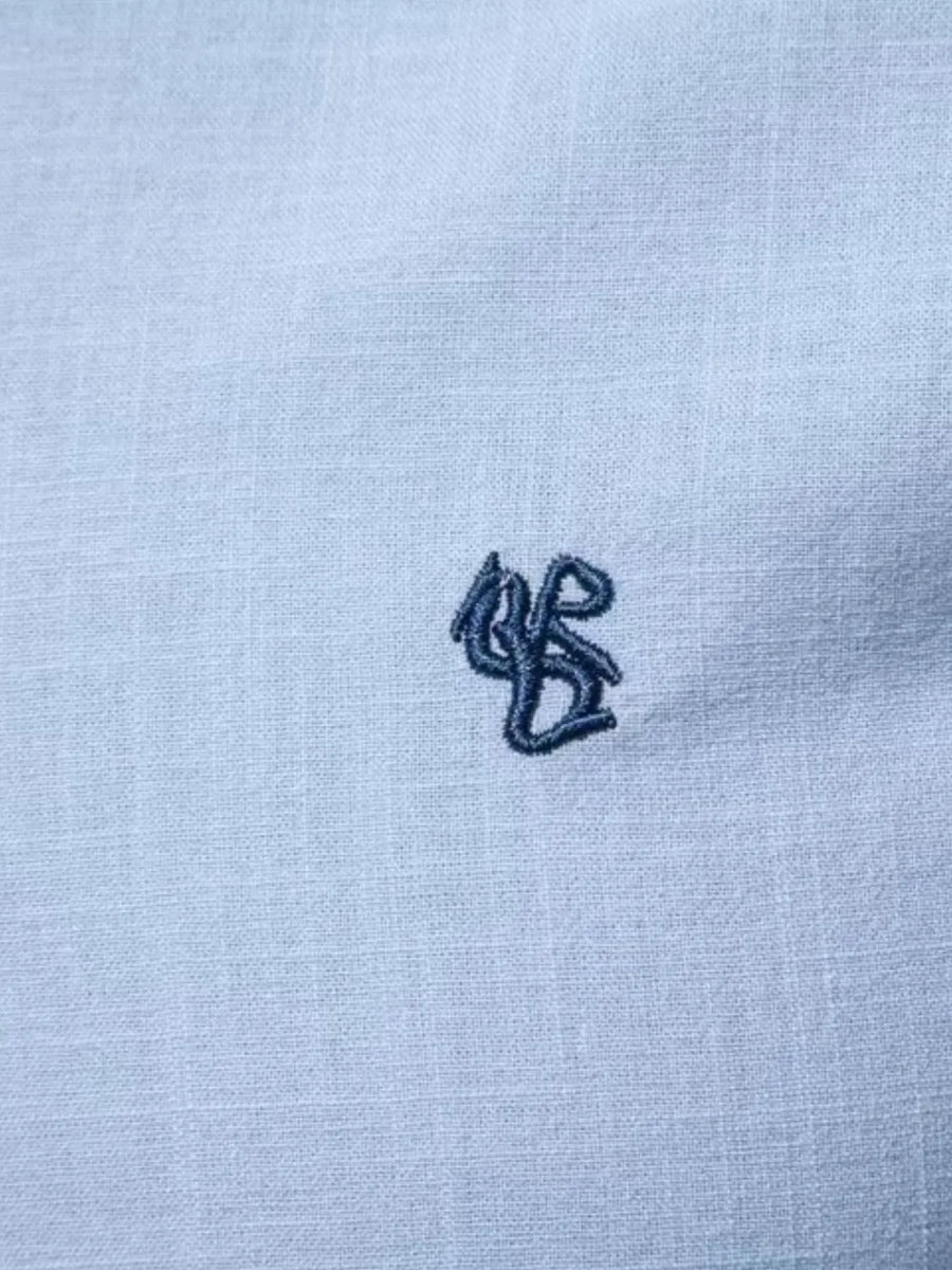 Light blue linen shirt with embroidered detail