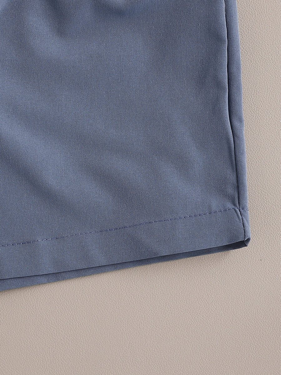 Toddler outfit set in royal blue cotton, showing hem detail