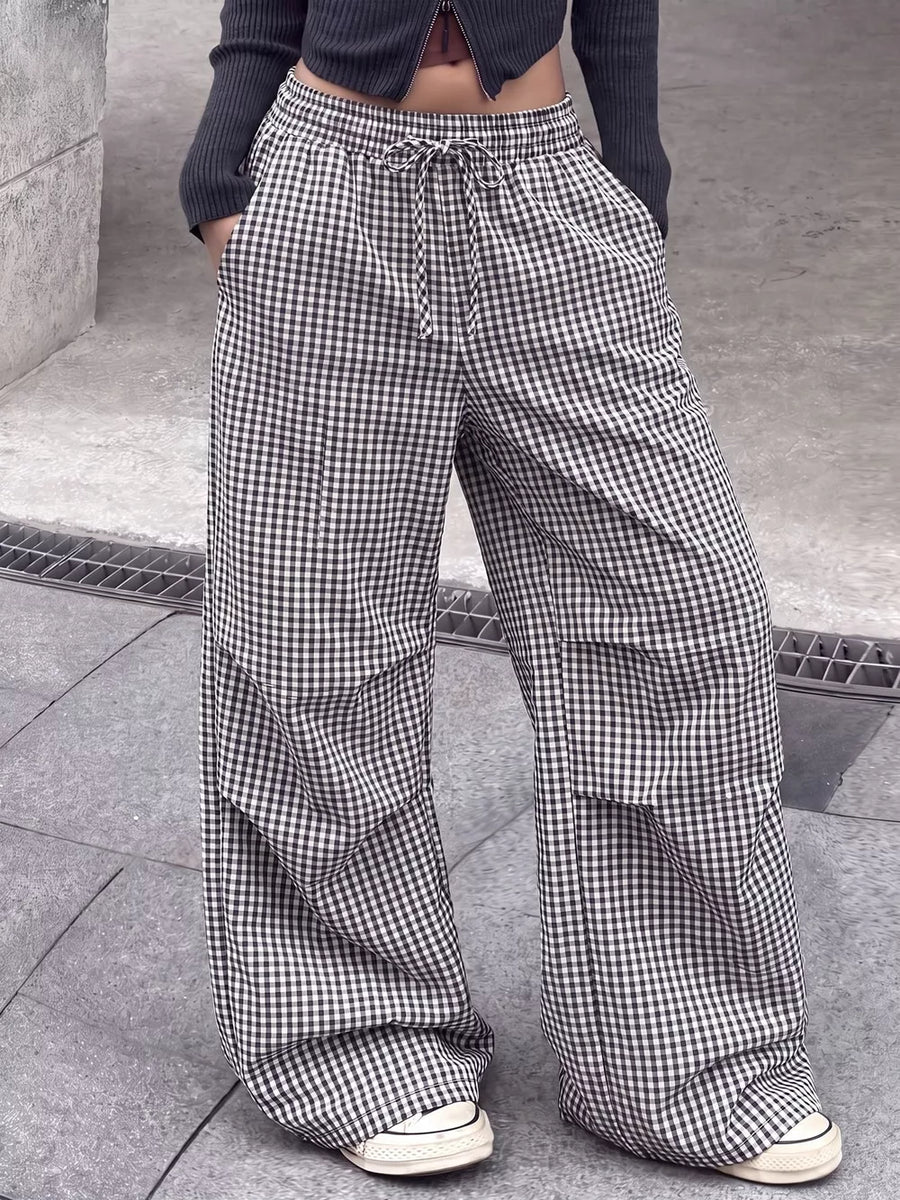 wide-leg pants in white with drawstring waist and full-length