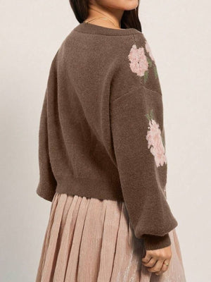 Black relaxed pullover sweater with off-shoulder