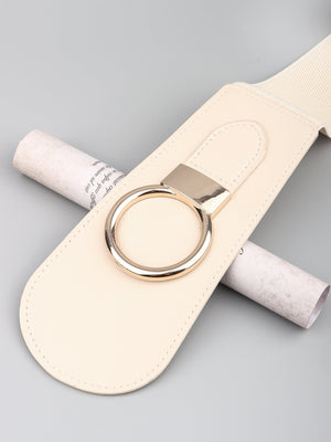Cream elastic belt with sculpted faux leather panel and gold ring buckle.