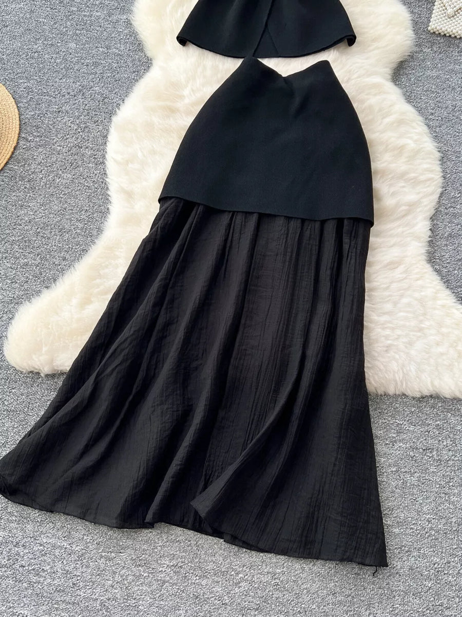 Black sheer two-piece set with button details, textured skirt