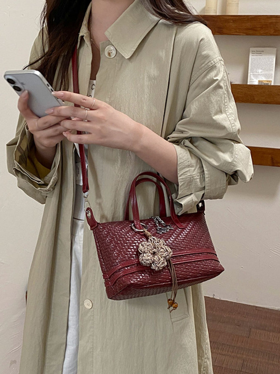 Brown crossbody bag with zip-front and woven