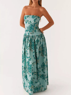 Turquoise floral printed strapless maxi dress with a gathered waist and full skirt.