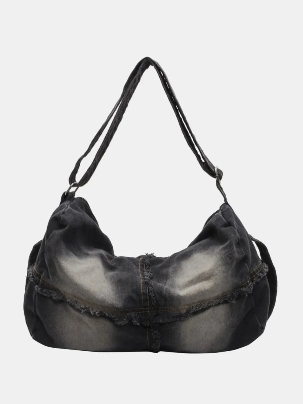 Frayed denim slouch crossbody bag in dark wash with distressed details.