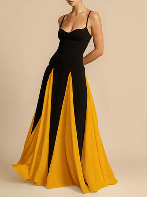 Black and yellow maxi dress with spaghetti straps and paneled skirt