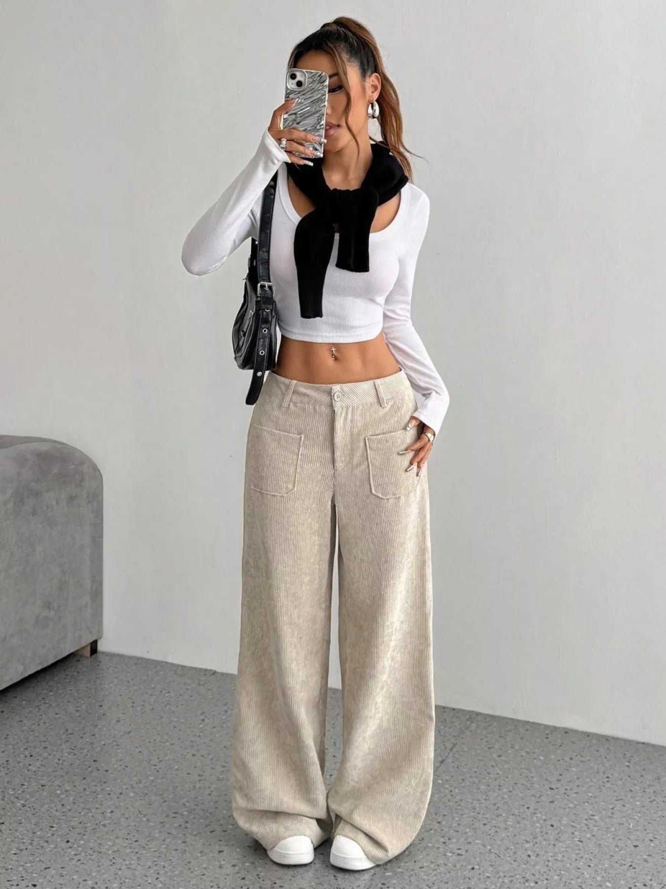 Chic wide-leg corduroy trousers in apricot with large front pockets and a relaxed fit.