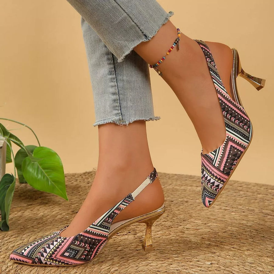 Geometric patterned slingback kitten heels in multicolor with a pointed toe and gold heel.