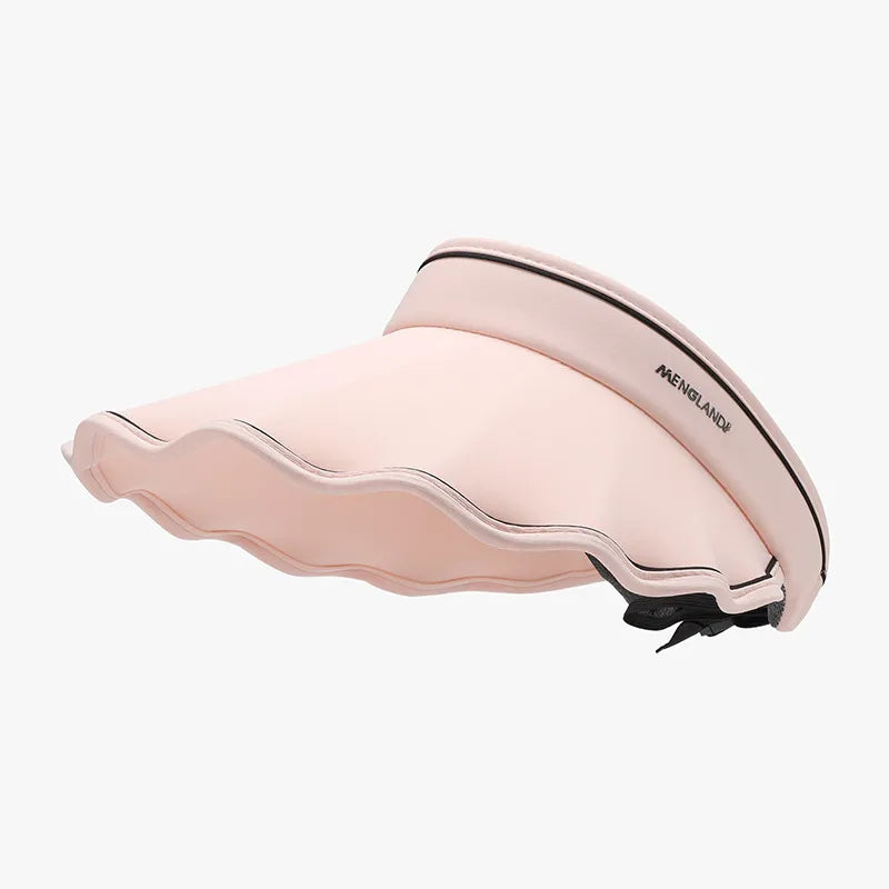 Scalloped brim sun visor in blush pink with black trim and adjustable strap.