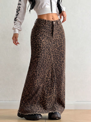 maxi skirt in brown featuring raw hem and straight fit