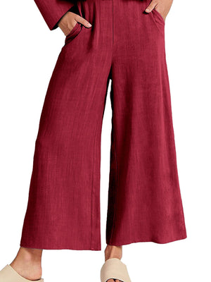 Red ruffled hem two-piece set with pockets and wide-leg pants.