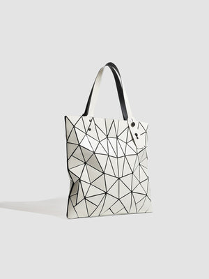 black handbag with snap and geometric