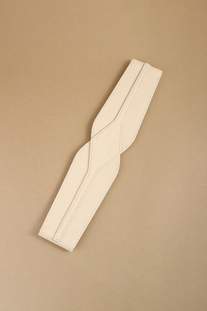 Ivory elastic belt with sculpted waist detail and tonal stitching