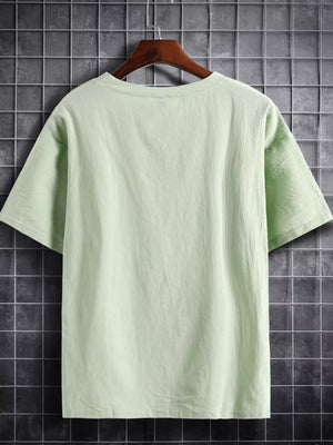 Light green cotton crew neck t-shirt with short sleeves.