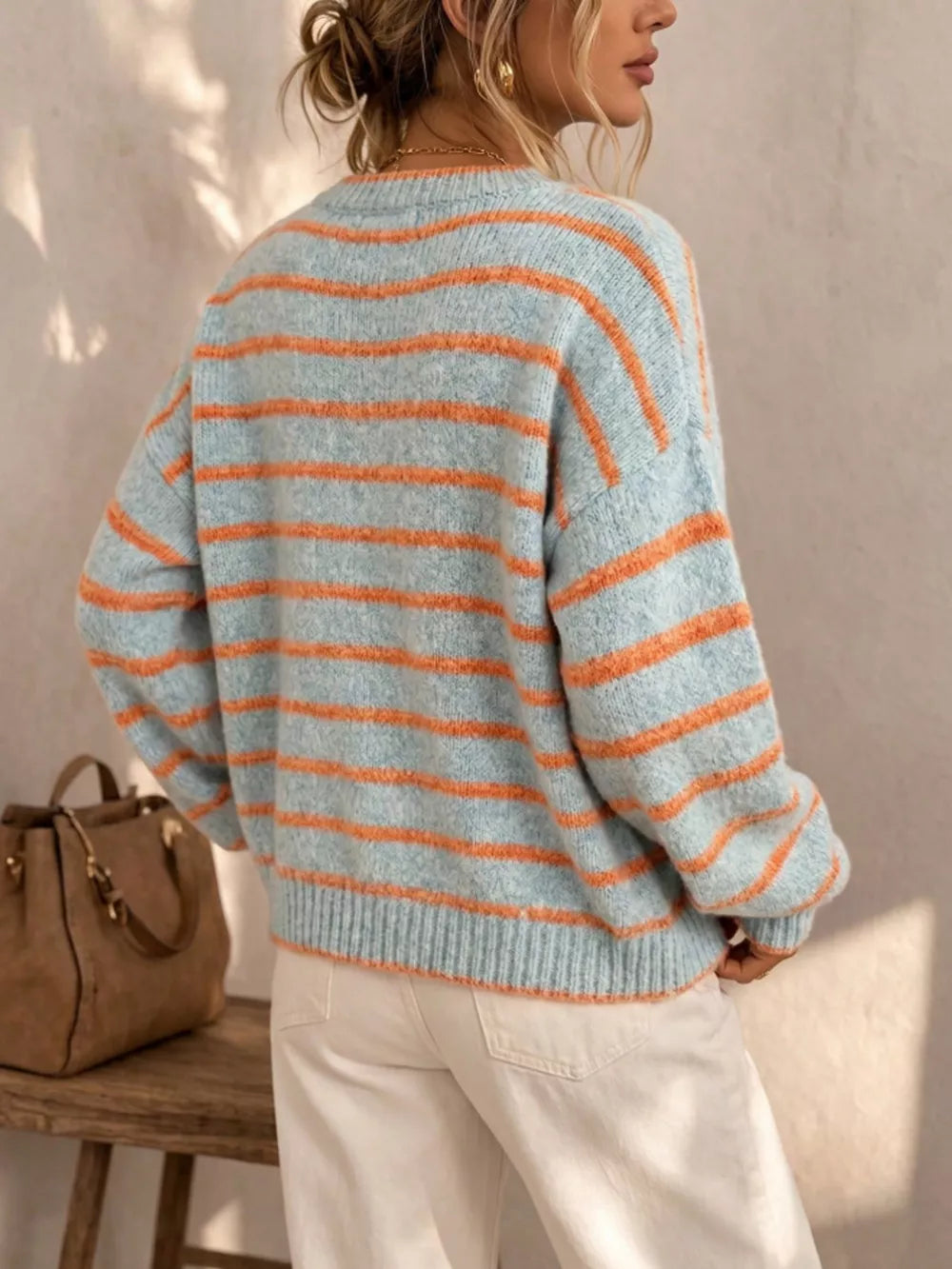 sky blue cardigan with hip-length and button-front