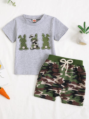 Gray cotton t-shirt with three bunny graphics and camo shorts with drawstring.
