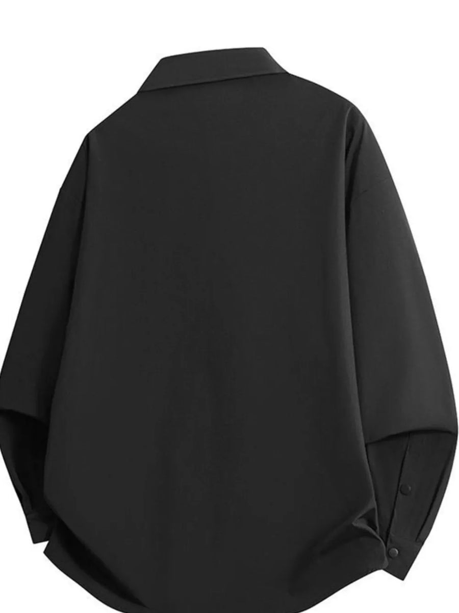 Black long sleeve collared shirt with button cuffs