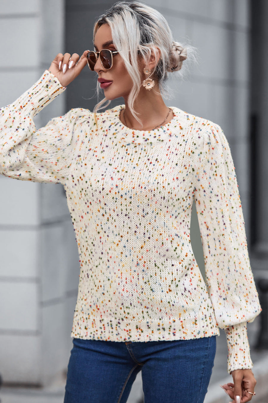Cream confetti speckle knit sweater with puff sleeves and crew neck.
