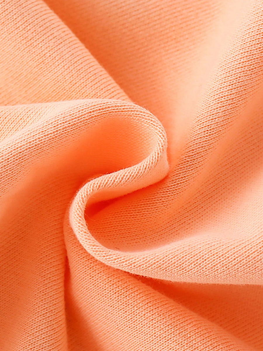 Tangerine cotton blend crew neck sweatshirt for kids, showing fabric texture.