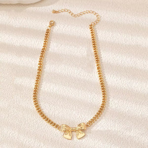 gold necklace with cropped and clasp