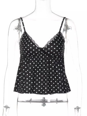 Black polka dot cami with white dots and lace trim neckline.