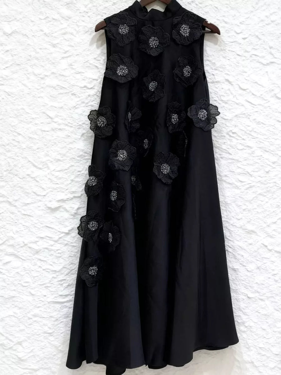 Black sleeveless mock neck midi dress with 3D floral appliques and sequin details.