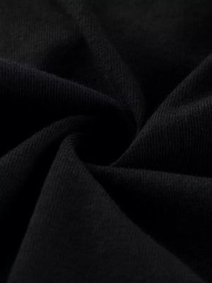 Black ribbed knit fabric with a soft texture.