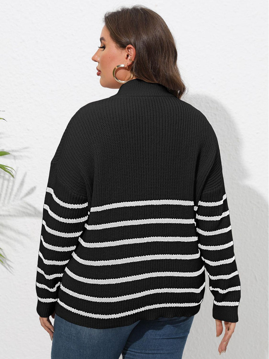 Black ribbed knit sweater with white horizontal stripes and a band collar.