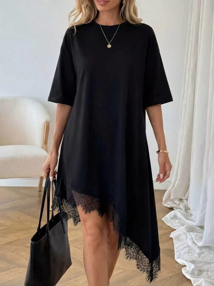 Black asymmetrical t-shirt dress with lace trim hem and short sleeves.