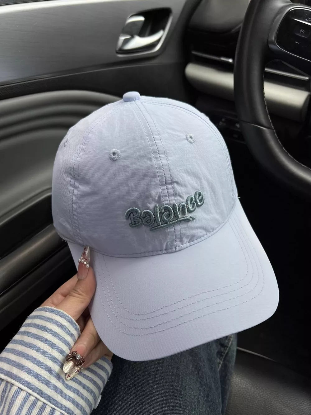 Light Blue embroidered cotton baseball cap with "Balance" text detail.