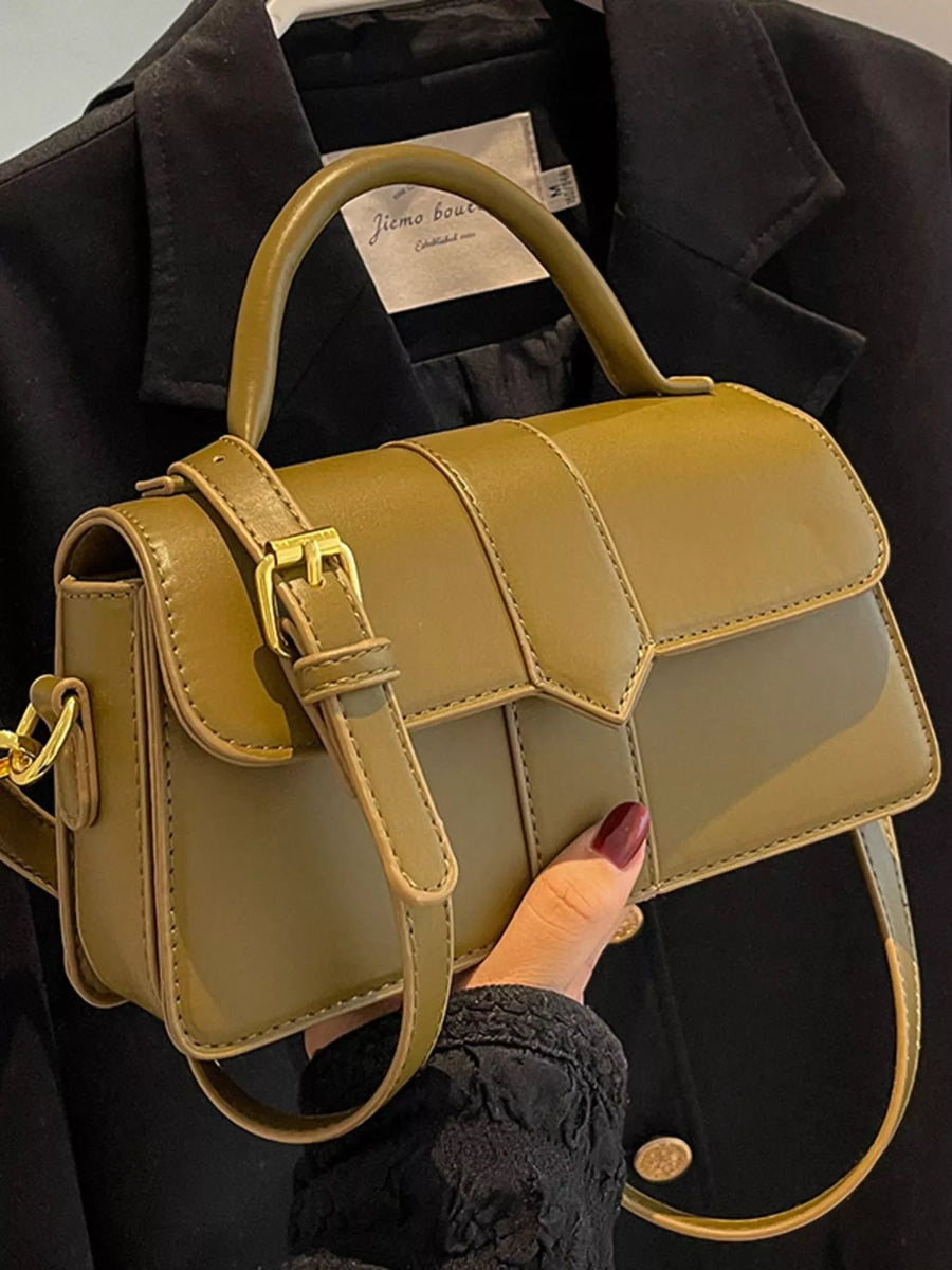 Green top handle shoulder bag with gold buckle and strap detail