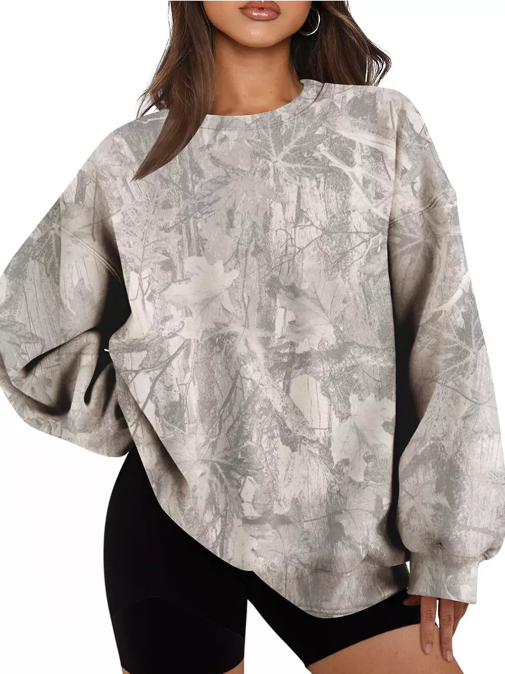 light gray sweatshirt with leaf-print and crew neck