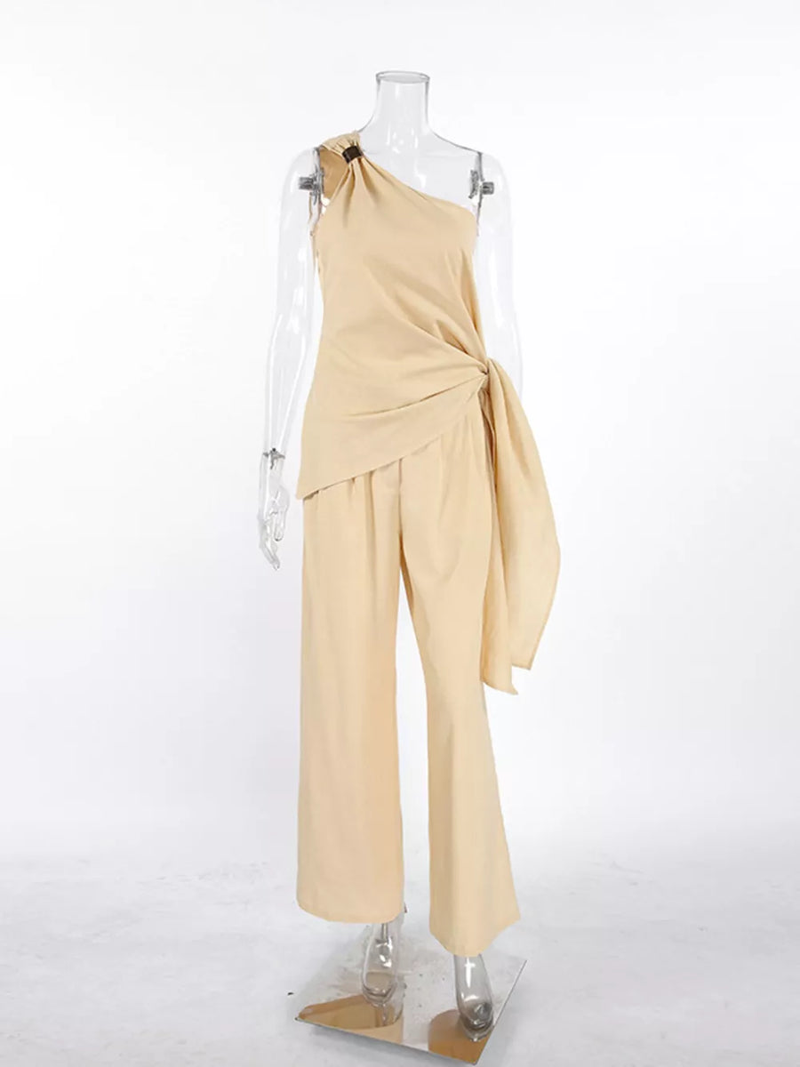 light beige two-piece set with one-shoulder and sleeveless