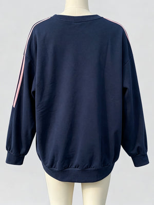 sweatshirt featuring striped in pink with 95% polyester, 5% spandex Care instructions: Machine wash cold texture