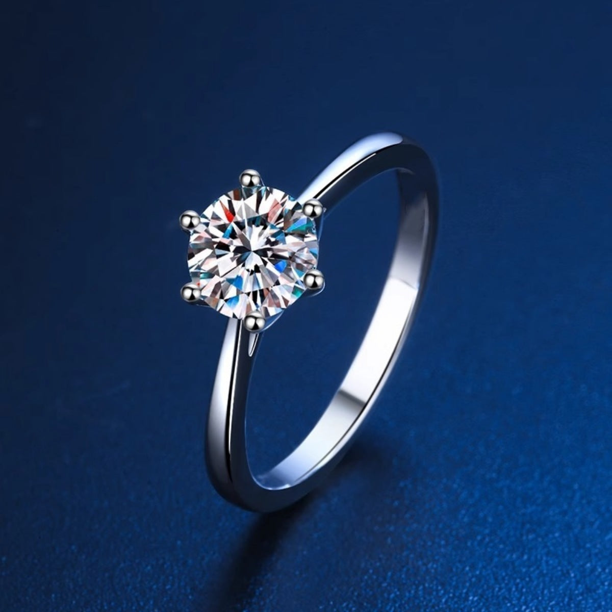 ring in silver featuring solitaire setting and classic fit