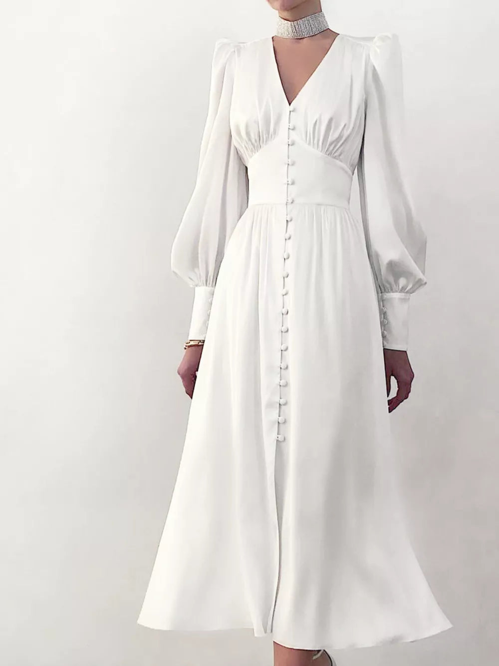 midi dress in white featuring buttoned and A-line fit