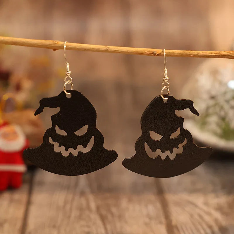 Black leather witch hat earrings with carved jack-o-lantern faces, Halloween jewelry