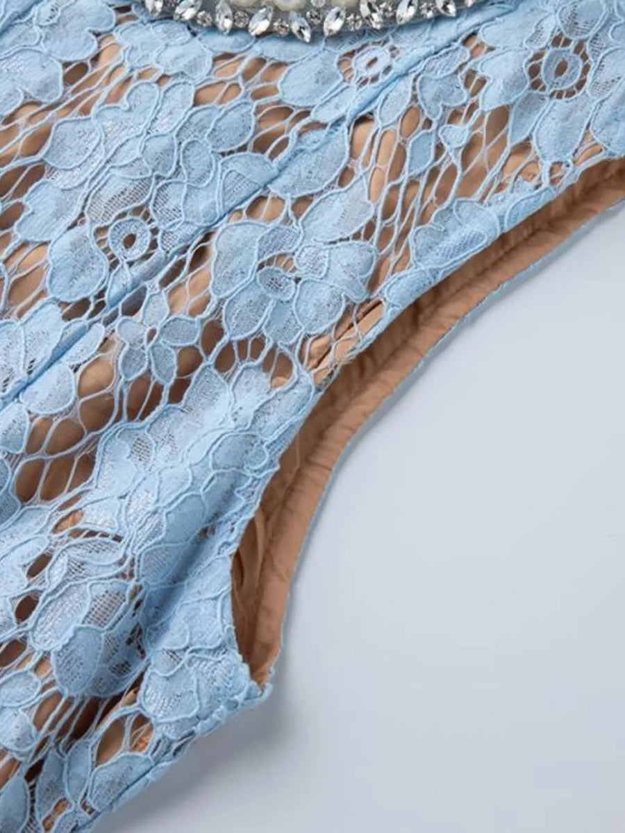 Blue lace dress with floral pattern and embellished neckline detail