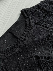 Black long sleeve t-shirt with intricate lace embellishments on the neckline and yoke.