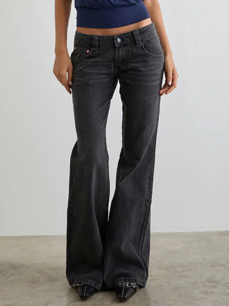 Dark gray low rise flare leg jeans with pockets and button fly.